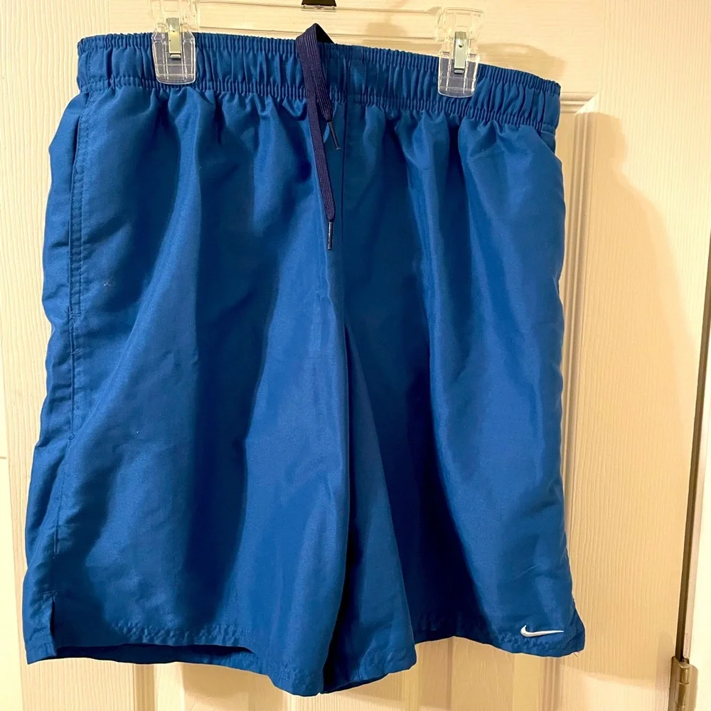 Men’s Nike Shorts size Medium, color Royal Blue, with dri weave lining,